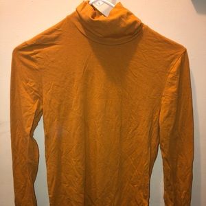 Orange turtle neck